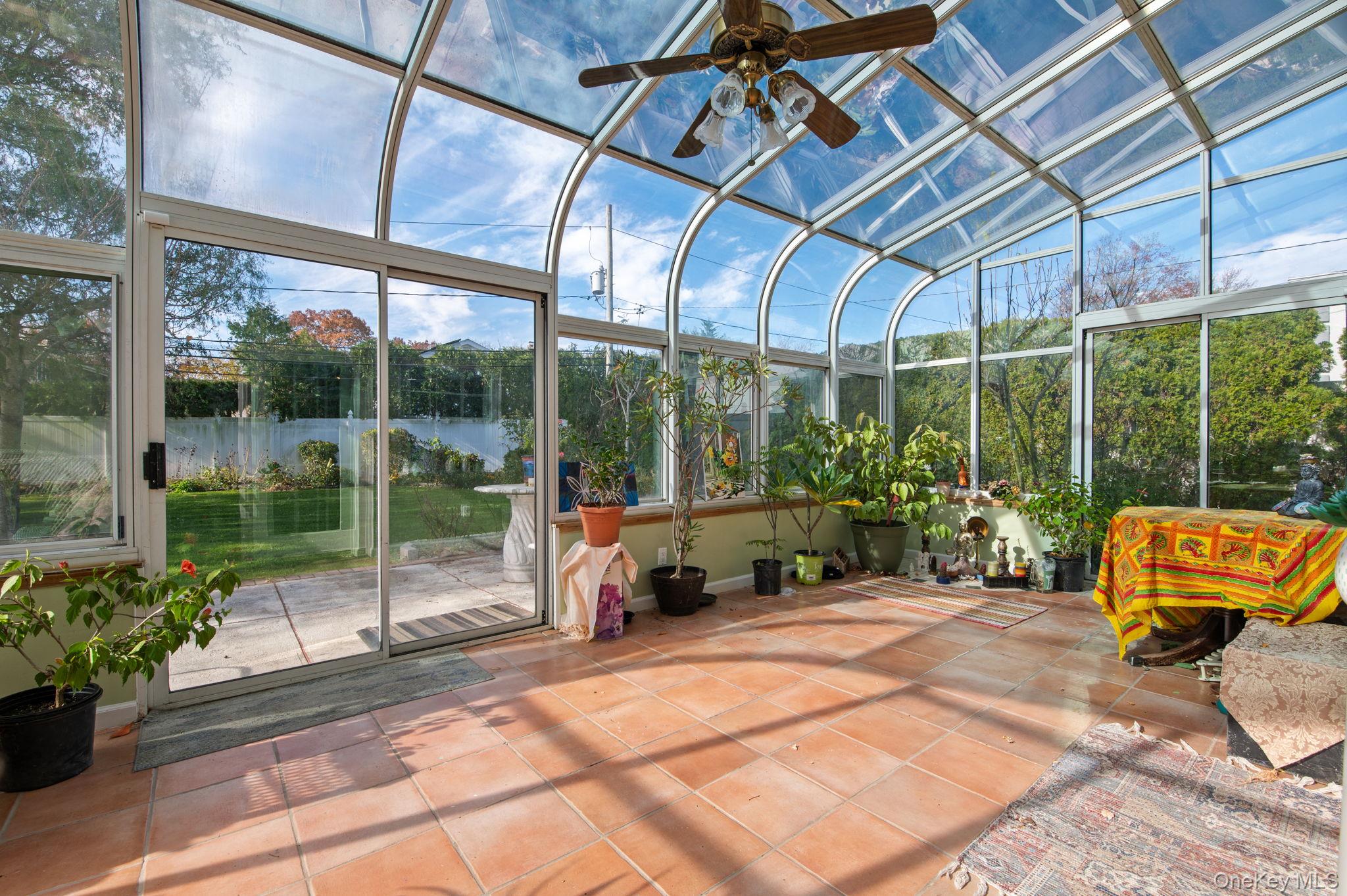 89 Nottingham Road Manhasset Hills, NY 11040 - Photo 15 of 44 a building outdoor space with seating space