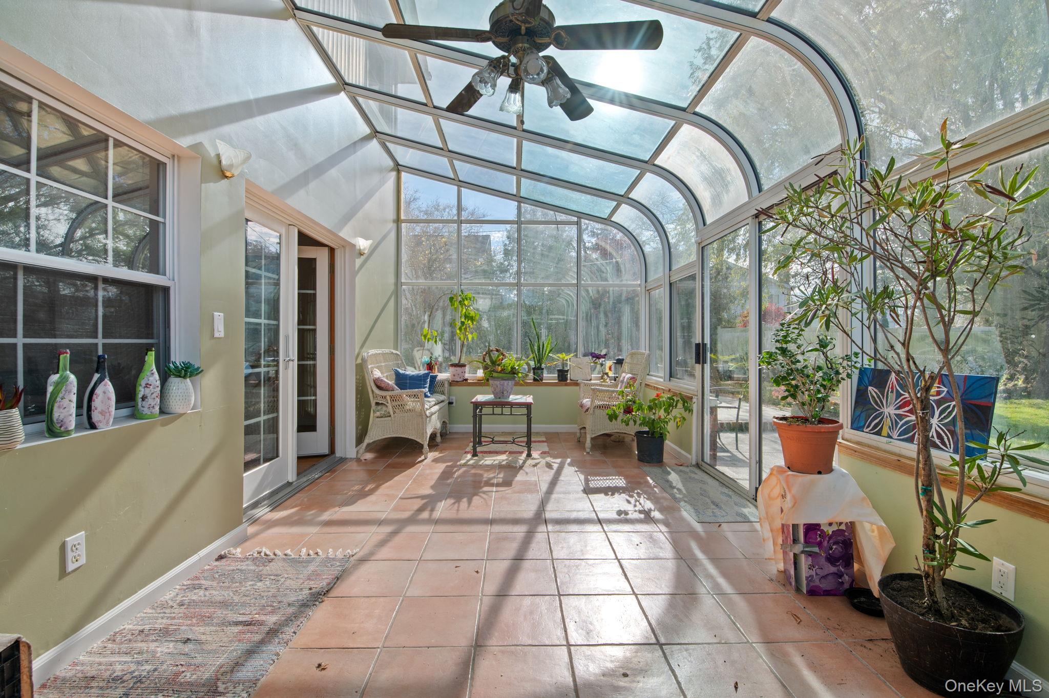 89 Nottingham Road Manhasset Hills, NY 11040 - Photo 16 of 44 a view of steet with seating space