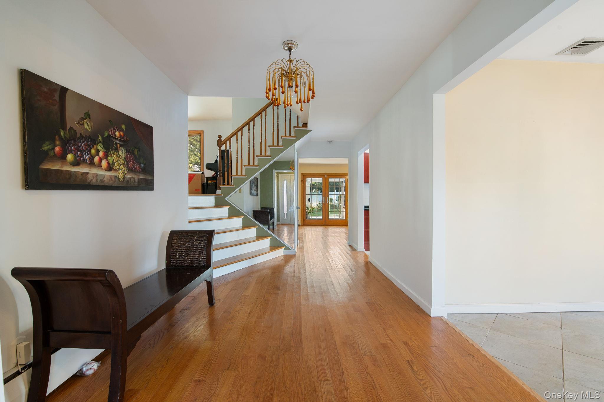 89 Nottingham Road Manhasset Hills, NY 11040 - Photo 3 of 44 a view of entryway with wooden floor