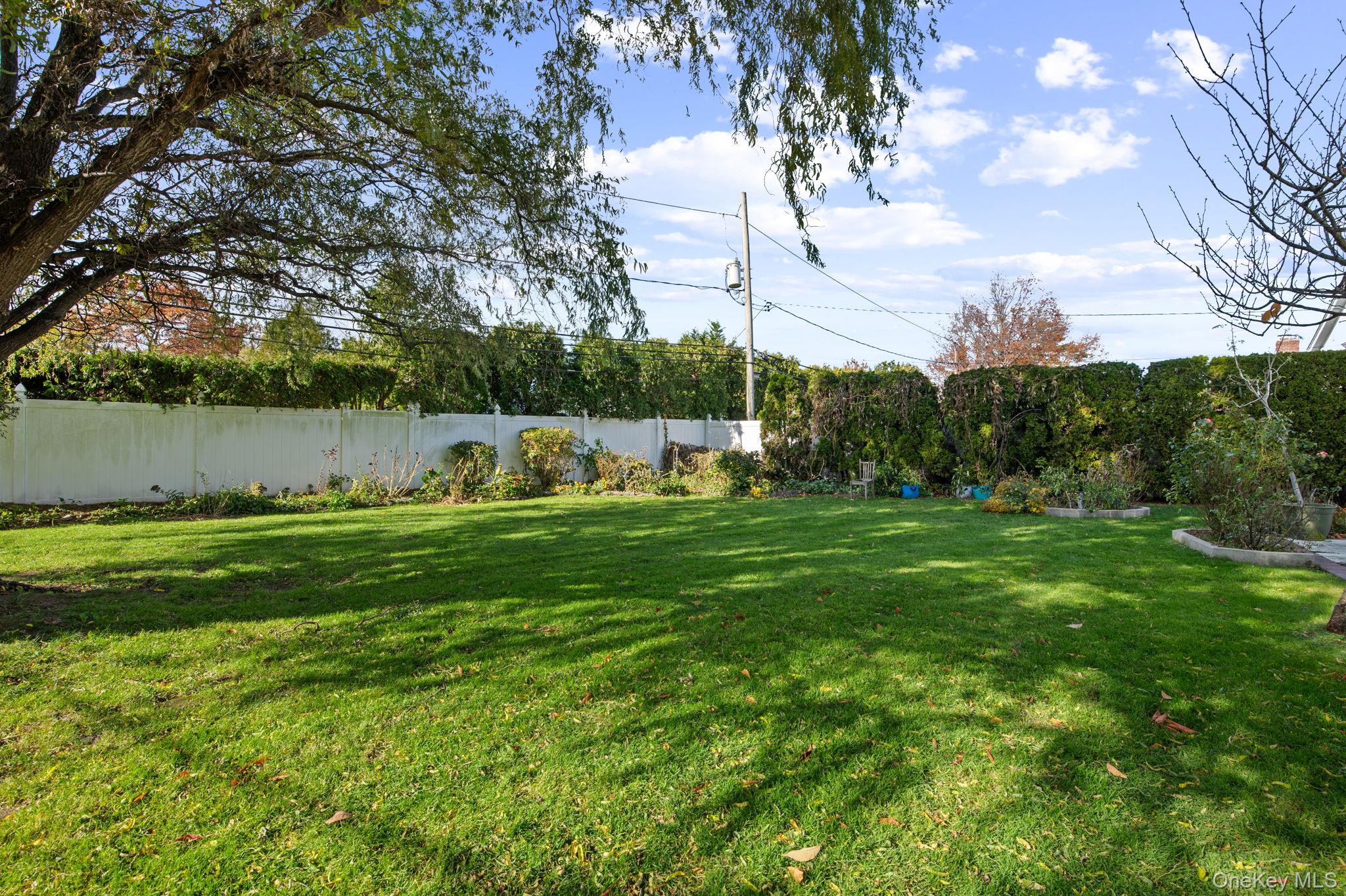 89 Nottingham Road Manhasset Hills, NY 11040 - Photo 35 of 44 a view of outdoor space and yard