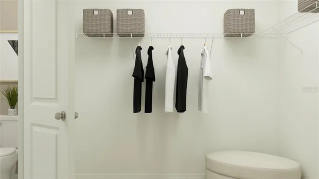 a bathroom with a toilet sink and tub