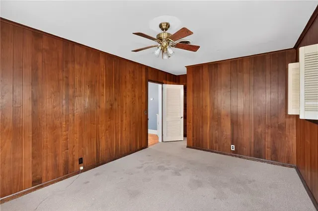 a view of an empty room and window