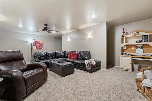 a front view of a building with a garden