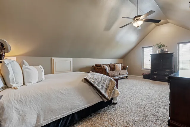 a view of a patio with table and chairs