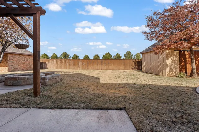 a bathroom with a sink a toilet and a shower