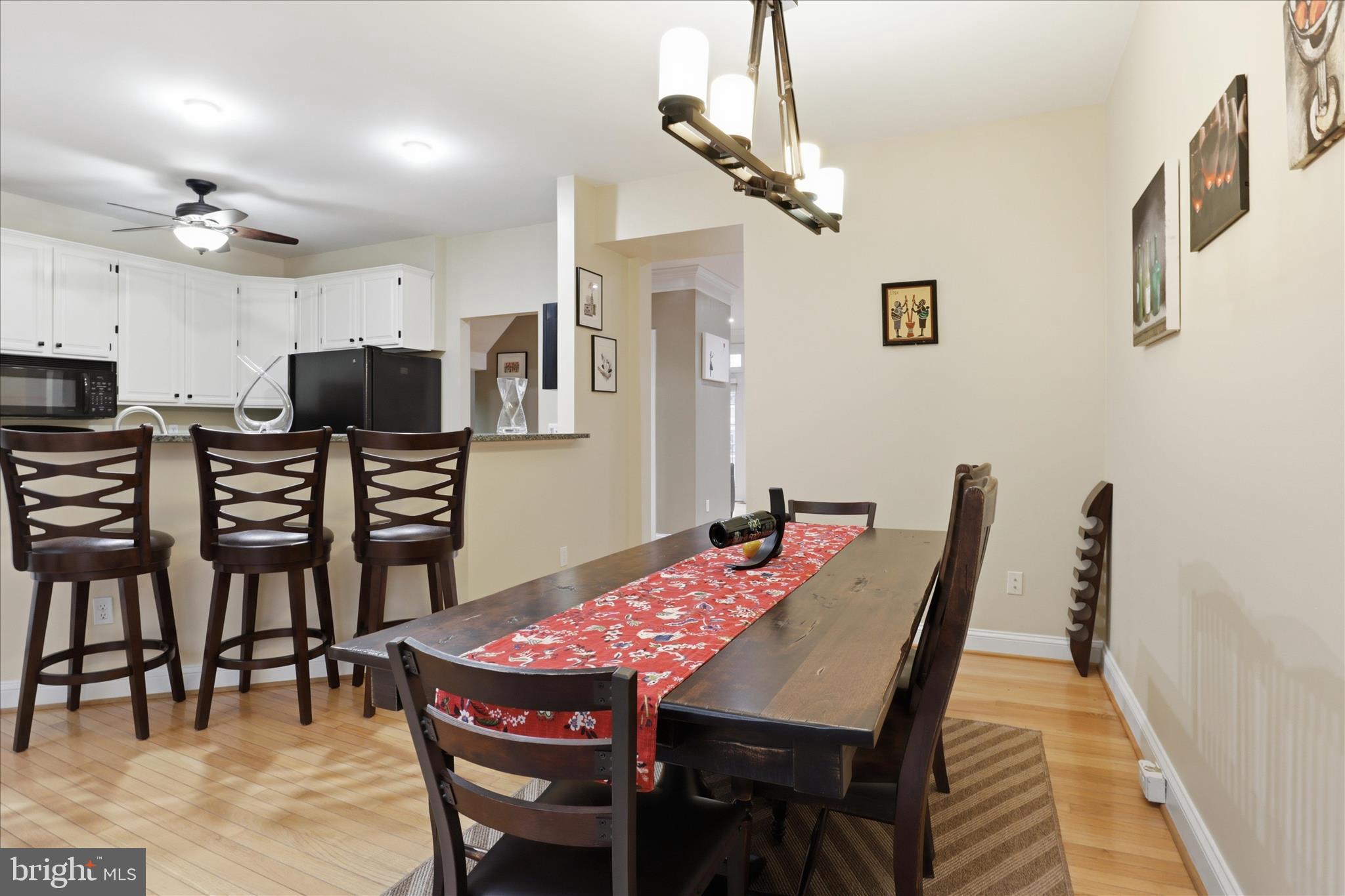 1319 Sundial Drive Reston, VA 20194 - Photo 12 of 49 a view of a dining room with furniture