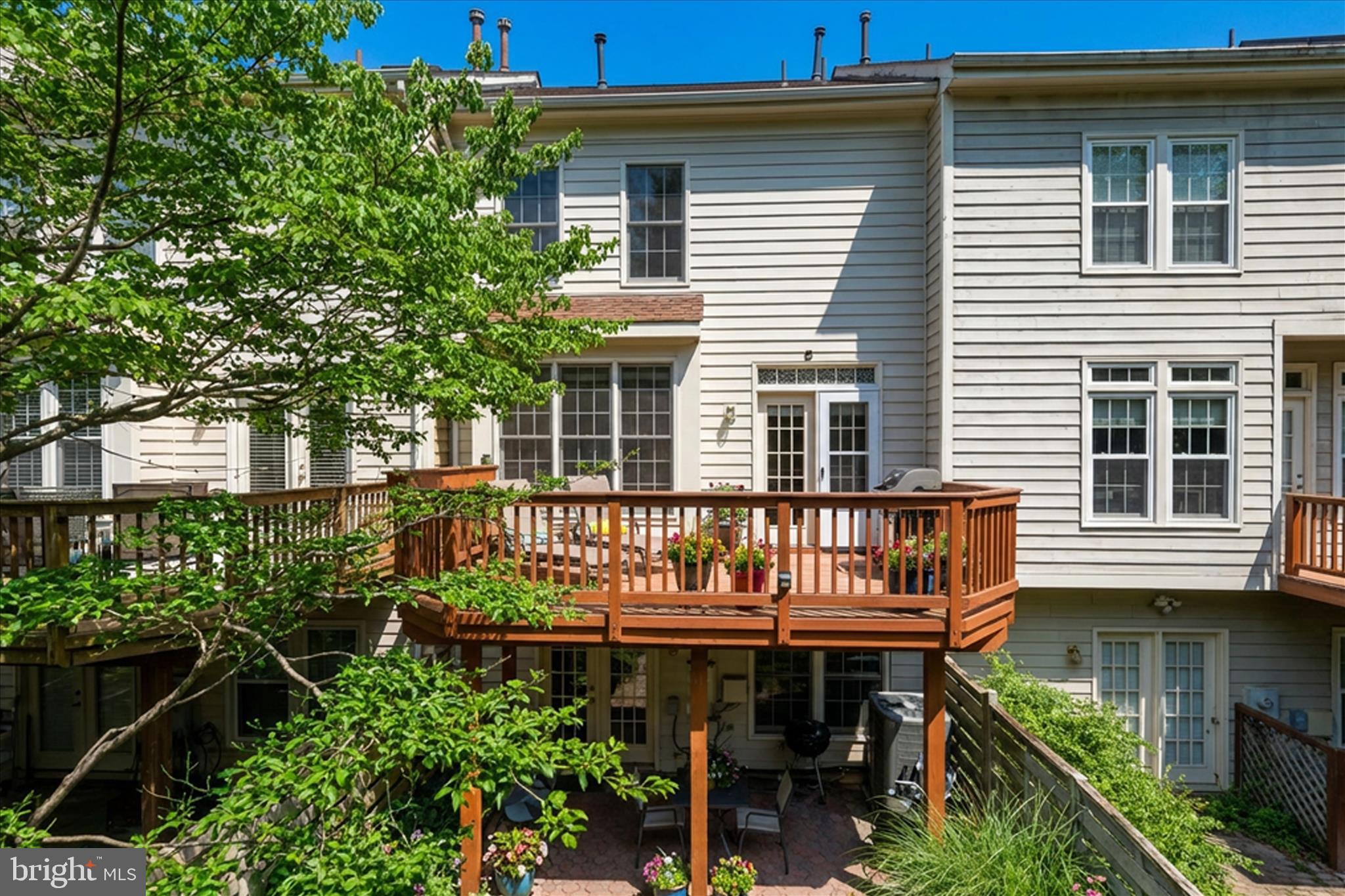 1319 Sundial Drive Reston, VA 20194 - Photo 24 of 49 a view of a house with a yard and sitting area