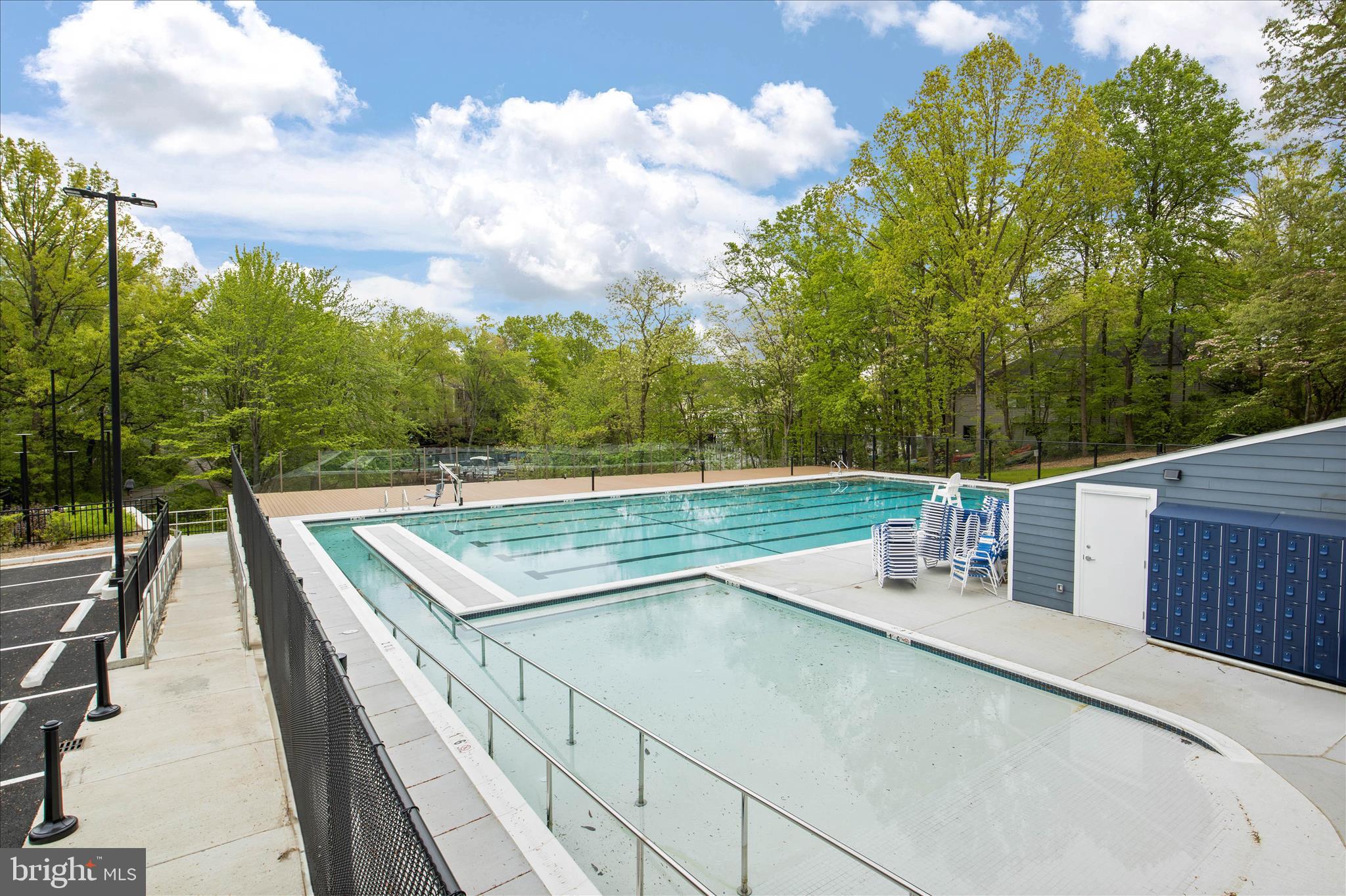 1319 Sundial Drive Reston, VA 20194 - Photo 32 of 49 a view of a swimming pool with a patio