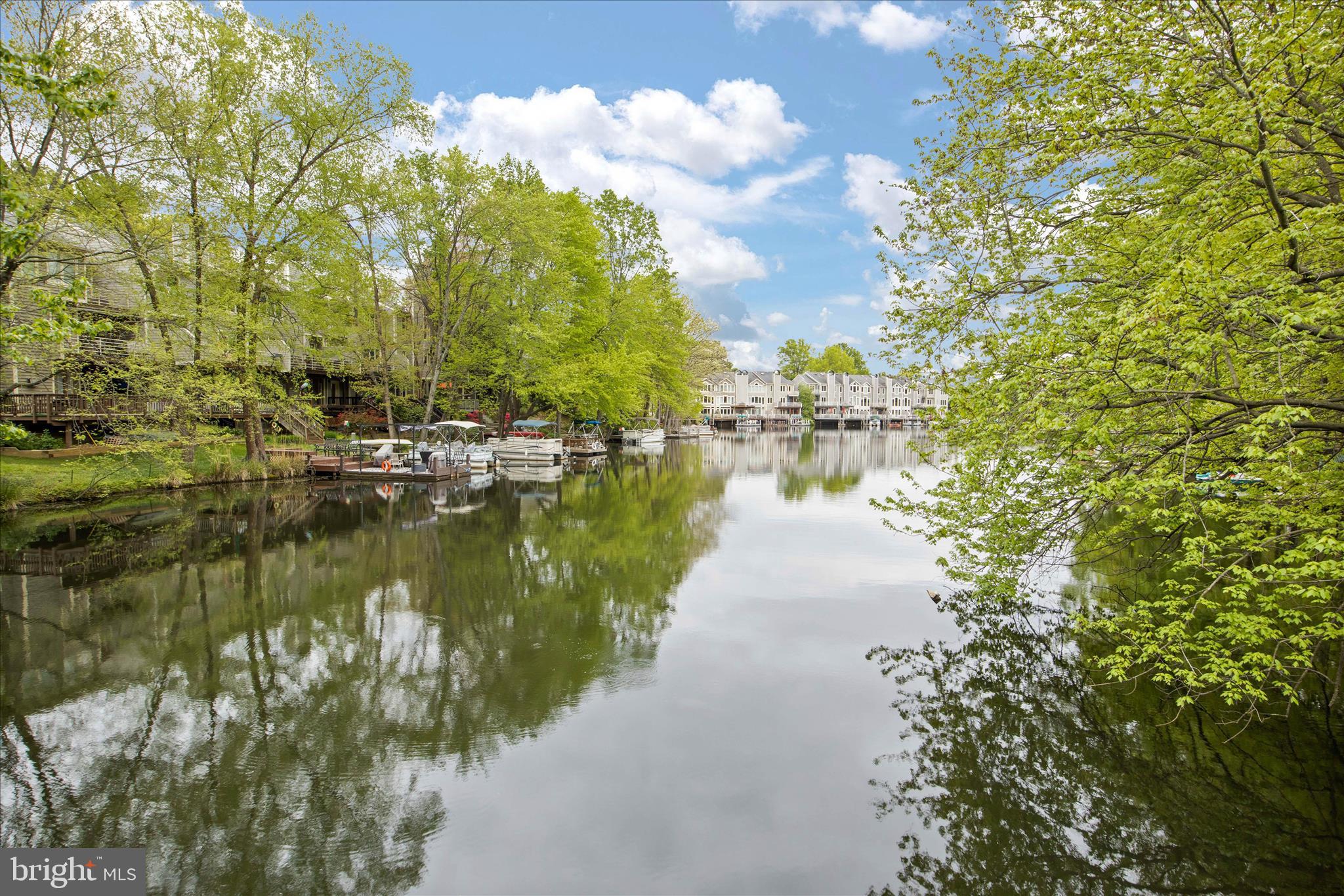 1319 Sundial Drive Reston, VA 20194 - Photo 34 of 49 a view of a lake with houses with outdoor space