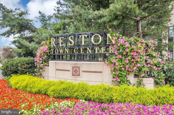 1319 Sundial Drive Reston, VA 20194 - Photo 36 of 49 a sign that is sitting in front of flowers