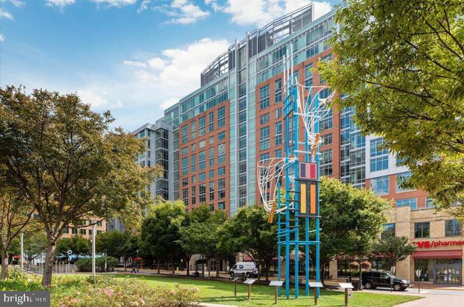 1319 Sundial Drive Reston, VA 20194 - Photo 40 of 49 a view of a building with a yard and trees