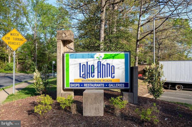 1319 Sundial Drive Reston, VA 20194 - Photo 41 of 49 a view of a park with plants and wooden fence