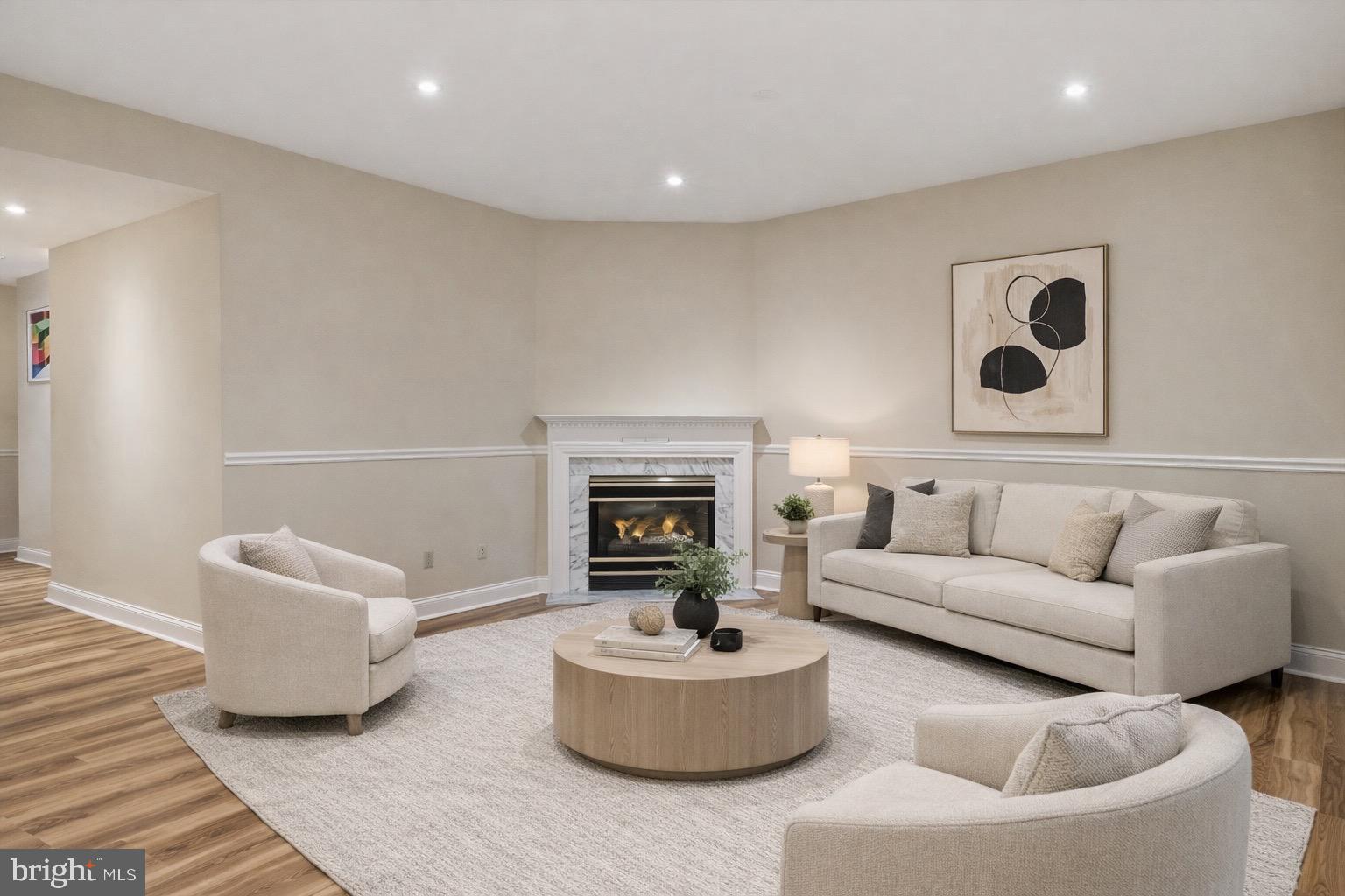 1319 Sundial Drive Reston, VA 20194 - Photo 6 of 49 a living room with furniture and a fireplace