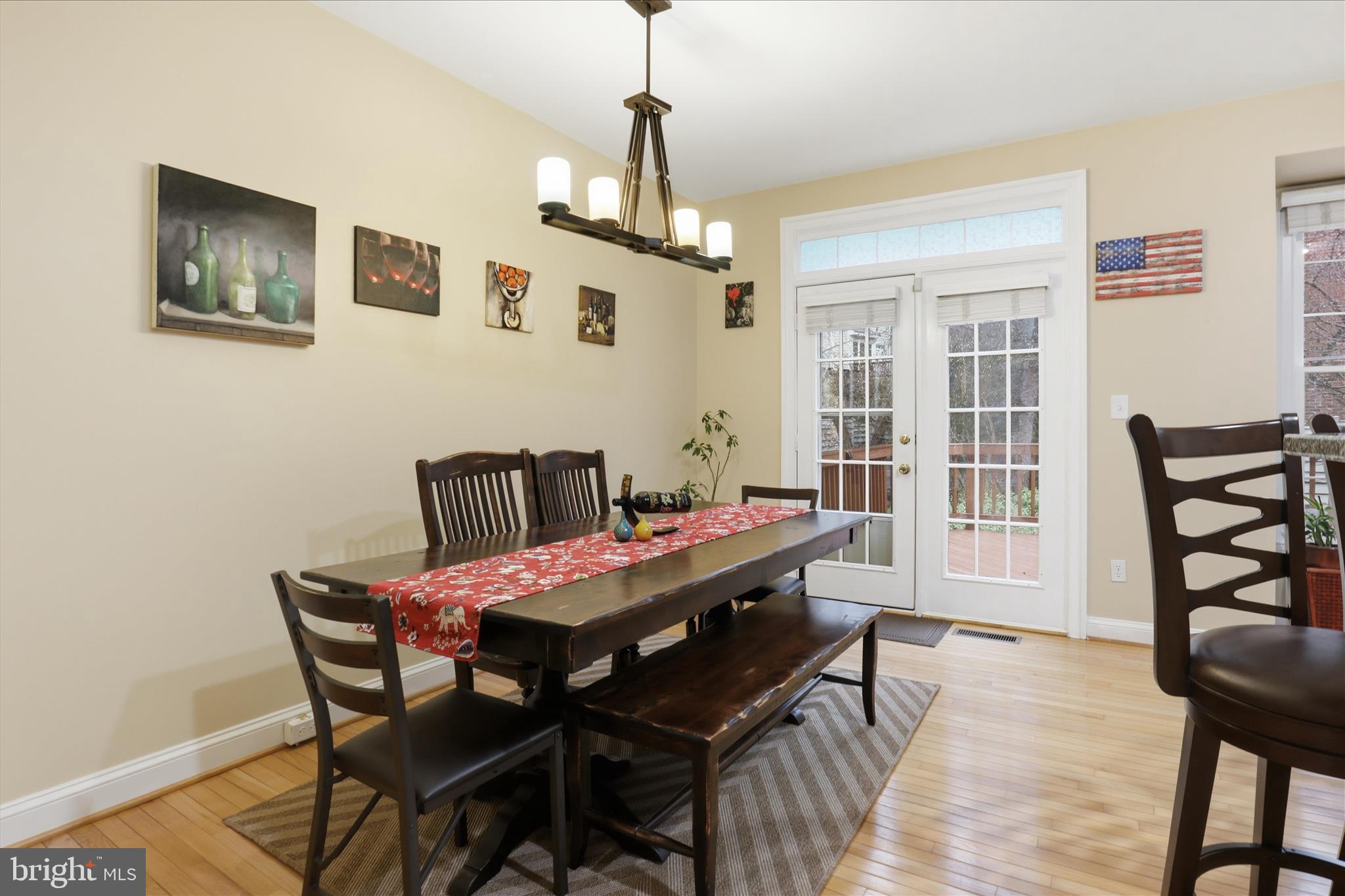 1319 Sundial Drive Reston, VA 20194 - Photo 10 of 49 a view of a dining room with furniture window and wooden floor