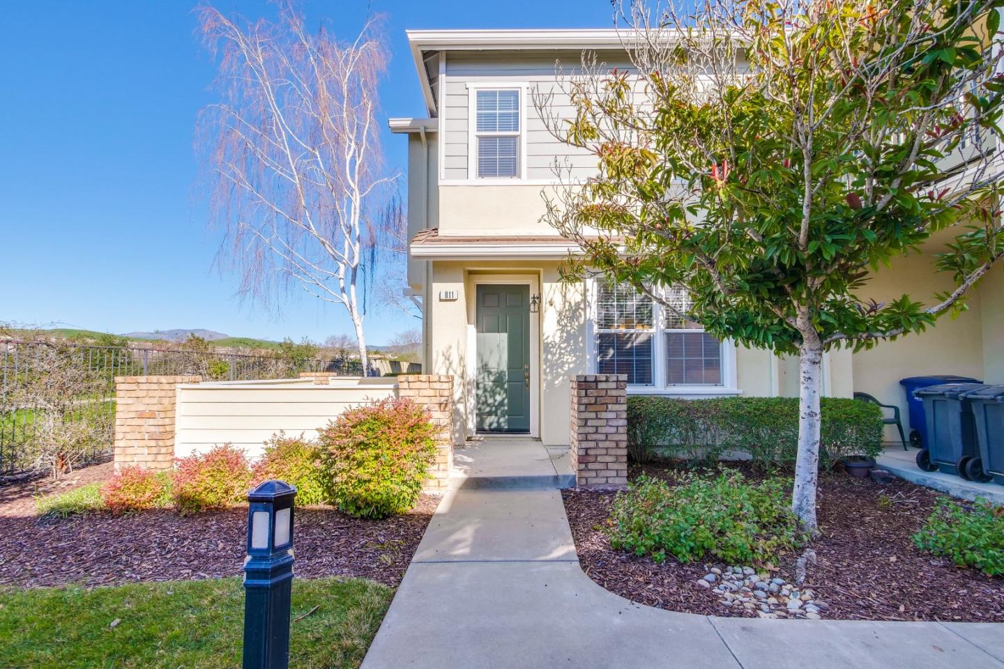 811 Joree Lane San Ramon, CA 94582 - Photo 1 of 43 a front view of a house with a garden and lake view