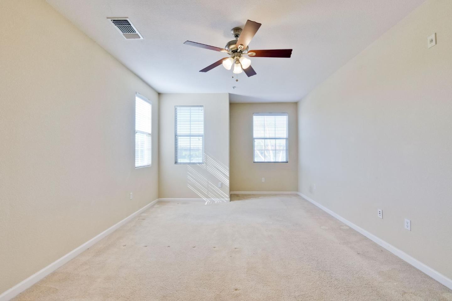 811 Joree Lane San Ramon, CA 94582 - Photo 29 of 43 an empty room with windows and fan
