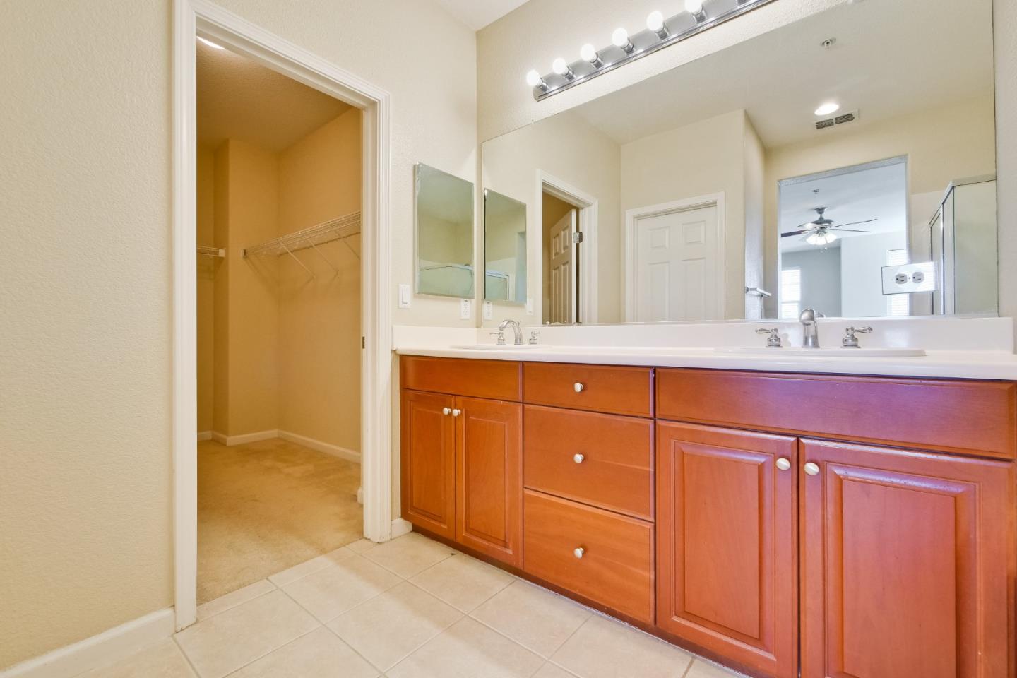 811 Joree Lane San Ramon, CA 94582 - Photo 31 of 43 a bathroom with a granite countertop sink mirror and