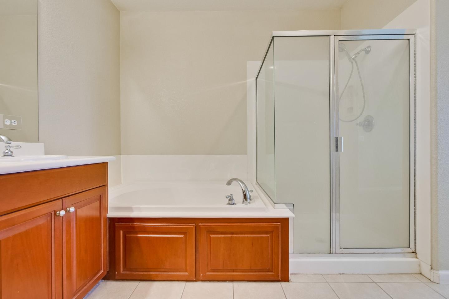 811 Joree Lane San Ramon, CA 94582 - Photo 32 of 43 a bathroom with a sink a vanity and a shower