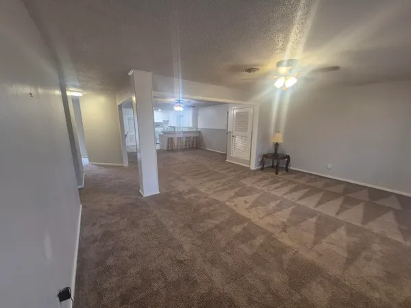 a view of a livingroom with a staircase