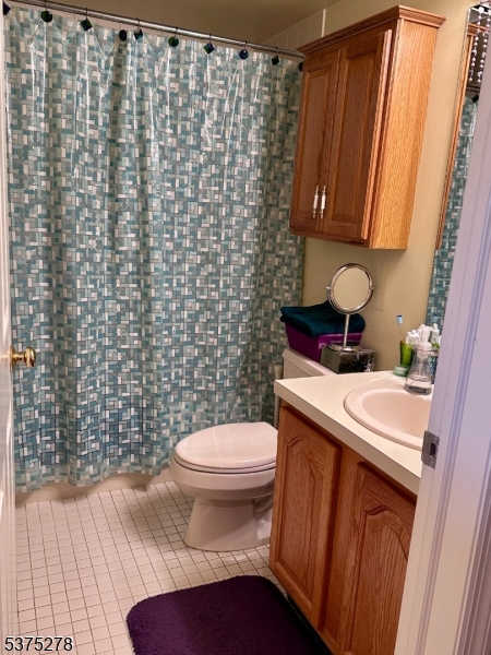 70 Boulder Run Road Paterson, NJ 07501 - Photo 9 of 29 a bathroom with a sink and a toilet