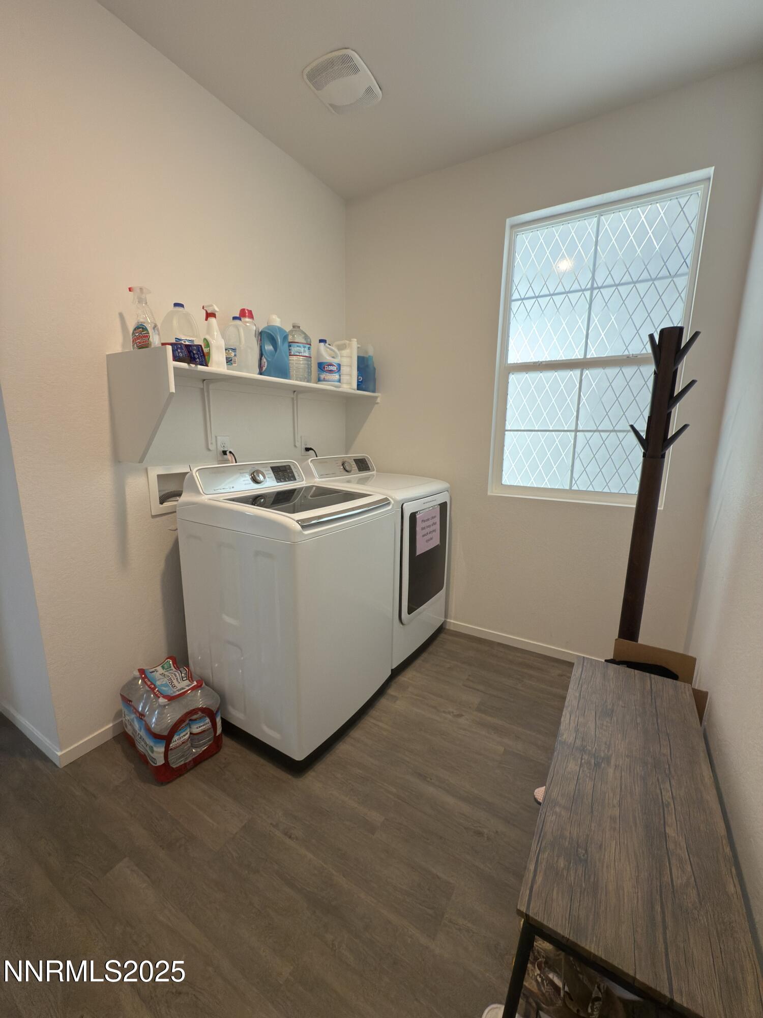 9774 Silver Dollar Lane Reno, NV 89506 - Photo 11 of 26 a room with a wooden floor and a sink