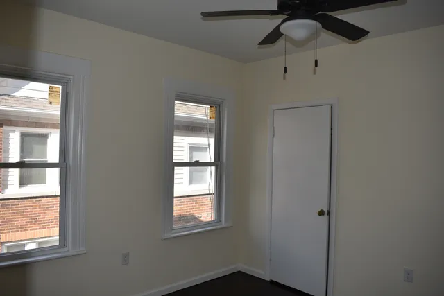 an empty room with windows