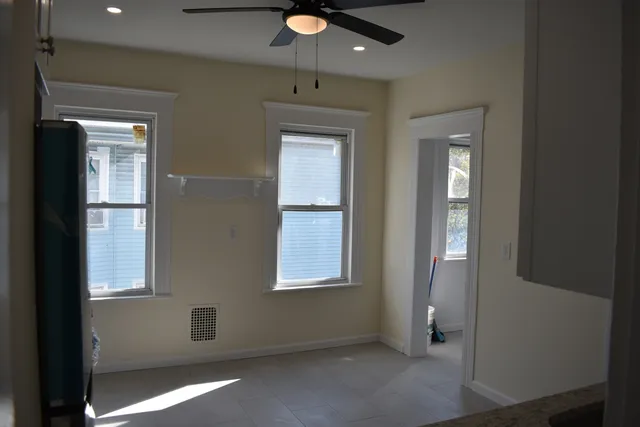 an empty room that has a window