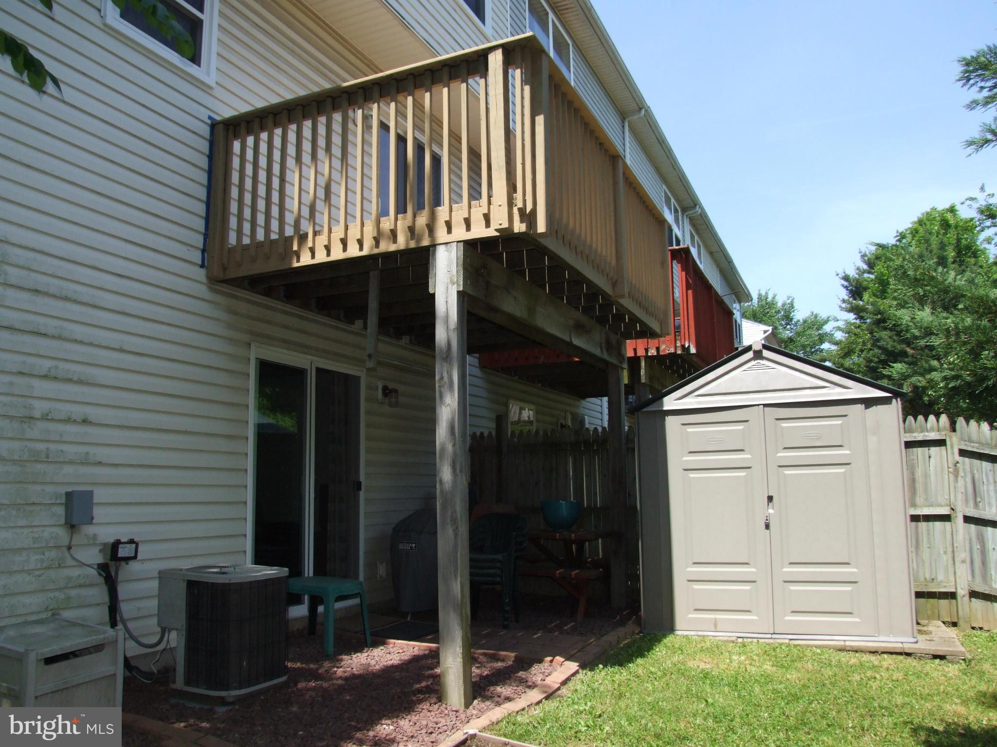 4619 Warren Tree Way Baltimore, MD 21229 - Photo 20 of 25 Wood Balcony Right off From the Kitchen