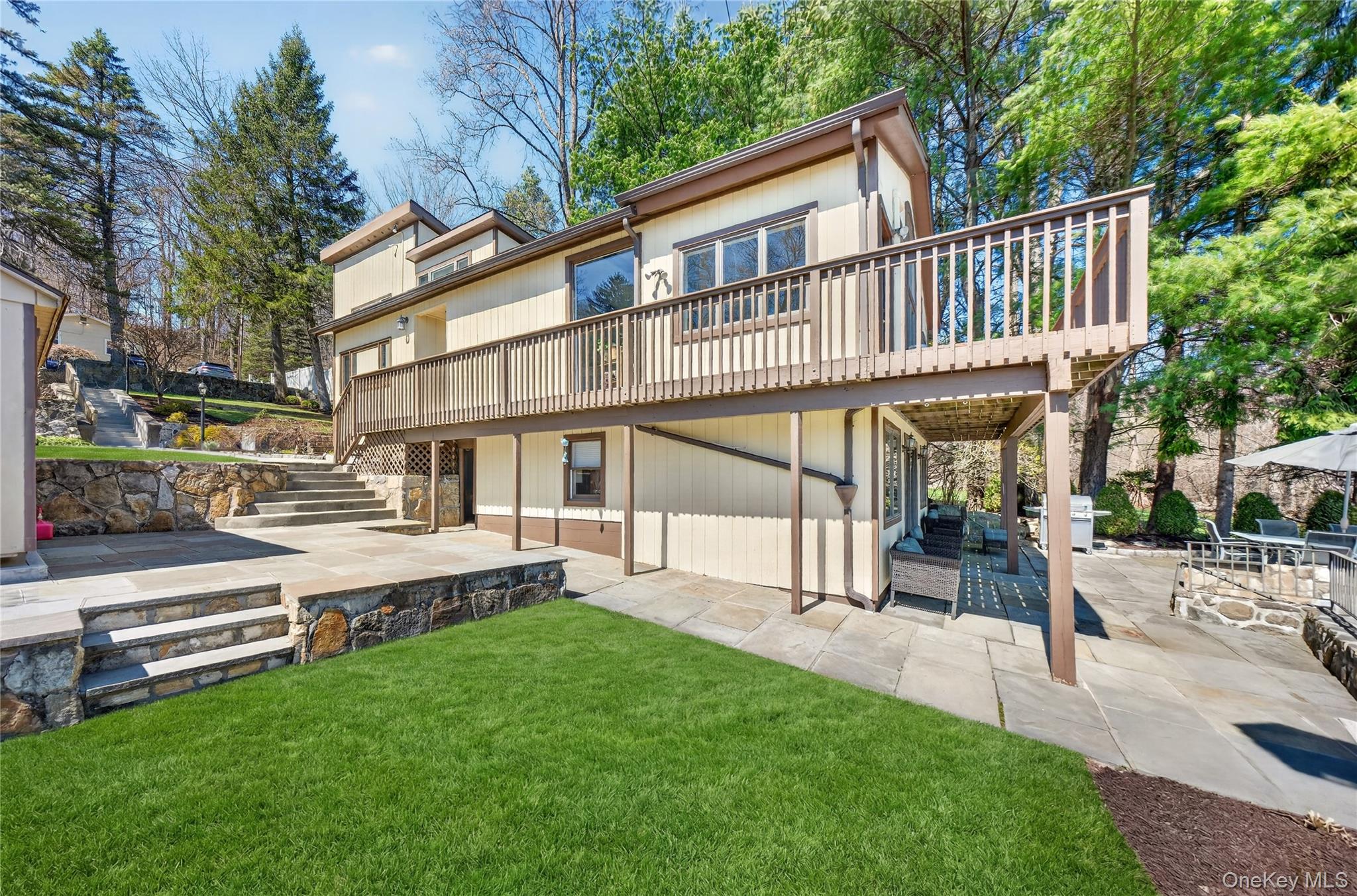 3 Lakeside Road Mahopac, NY 10541 - Photo 2 of 49 An expansive wraparound deck provides views from every angle.