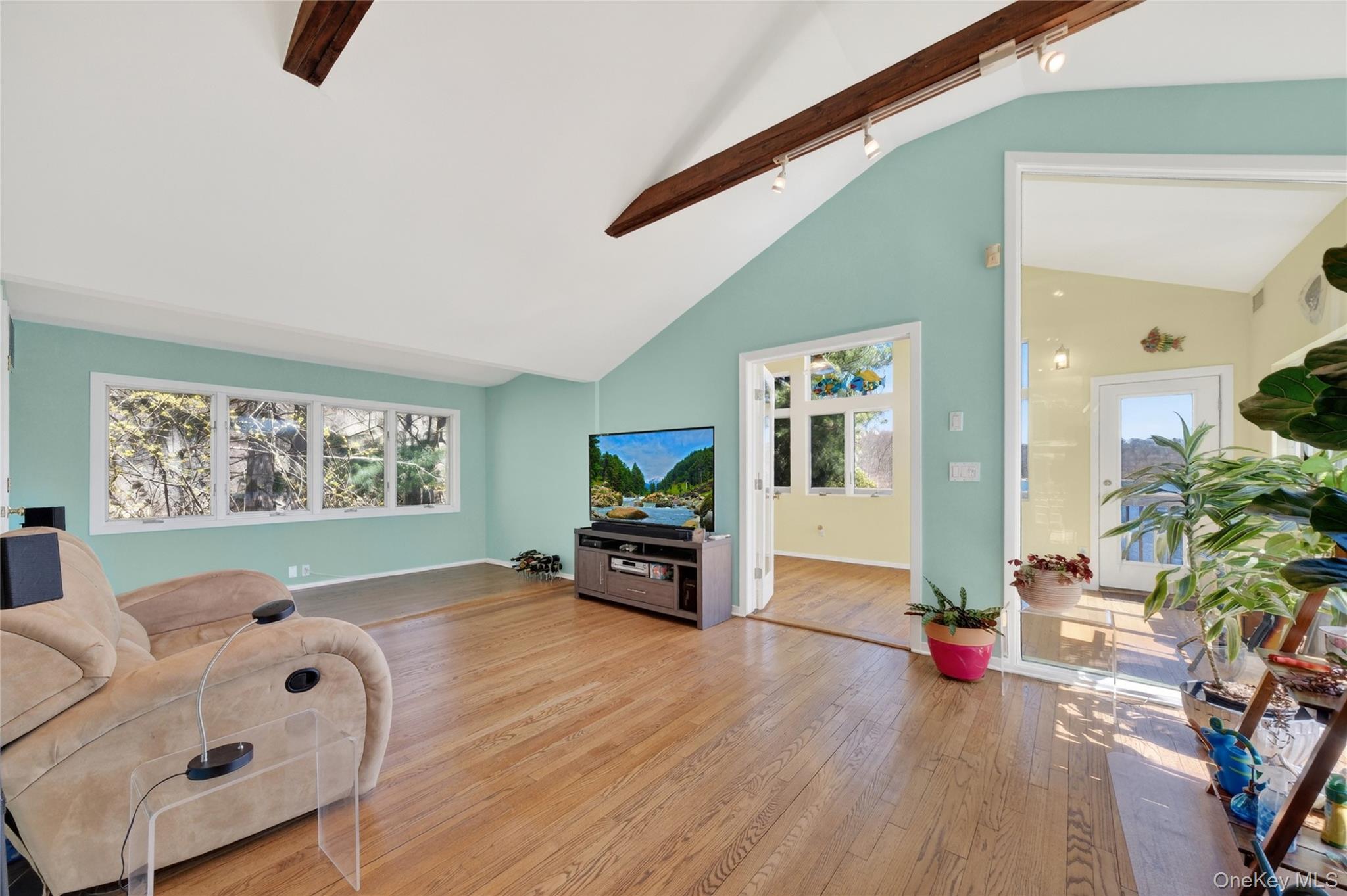 3 Lakeside Road Mahopac, NY 10541 - Photo 24 of 49 Notice the beamed cathedral ceiling in the living room.
