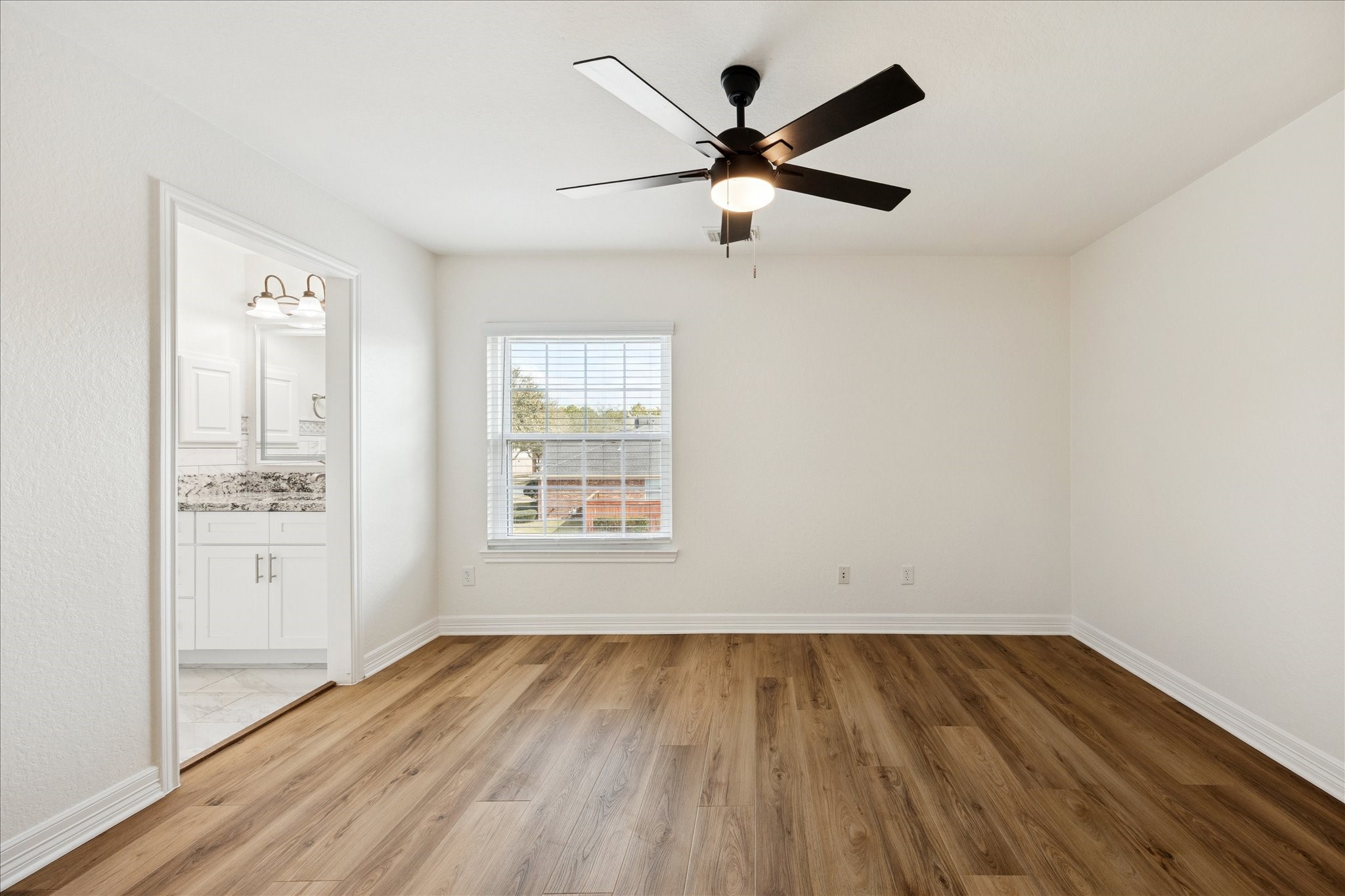 12003 Ensenada Canyon Lane Houston, TX 77041 - Photo 16 of 28 Secondary bedroom with generous space and a versatile layout.