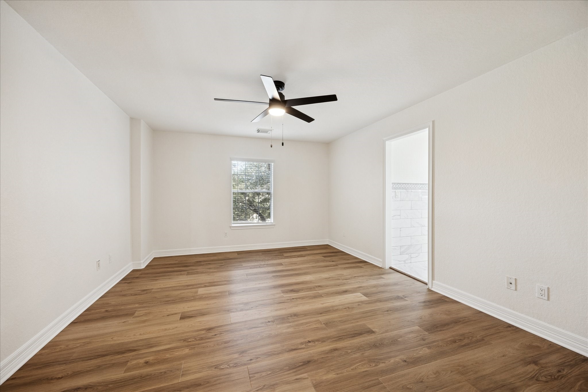 12003 Ensenada Canyon Lane Houston, TX 77041 - Photo 17 of 28 Comfortable secondary bedroom offering flexibility and privacy.