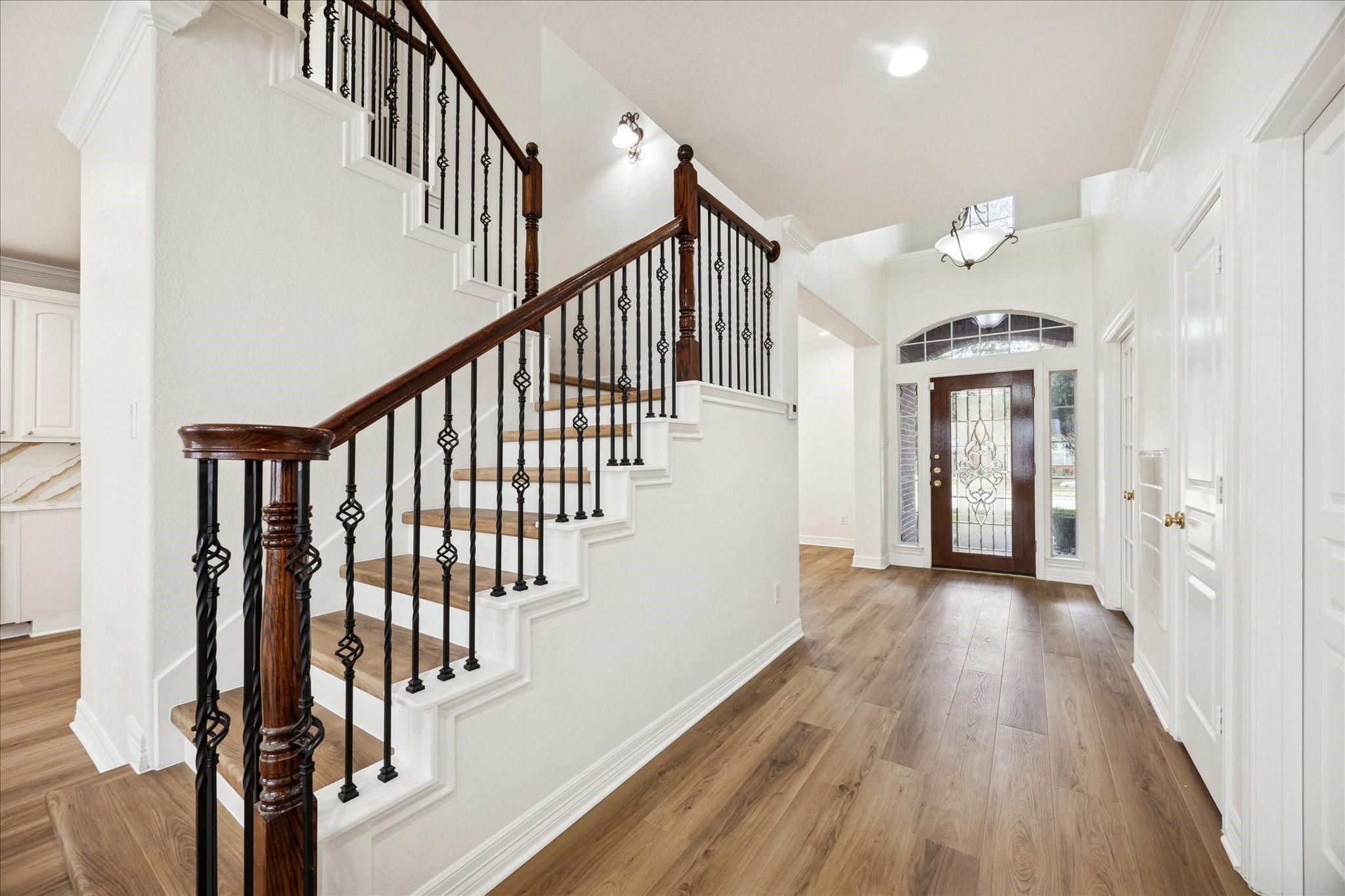12003 Ensenada Canyon Lane Houston, TX 77041 - Photo 2 of 28 Spacious entry with elegant staircase.