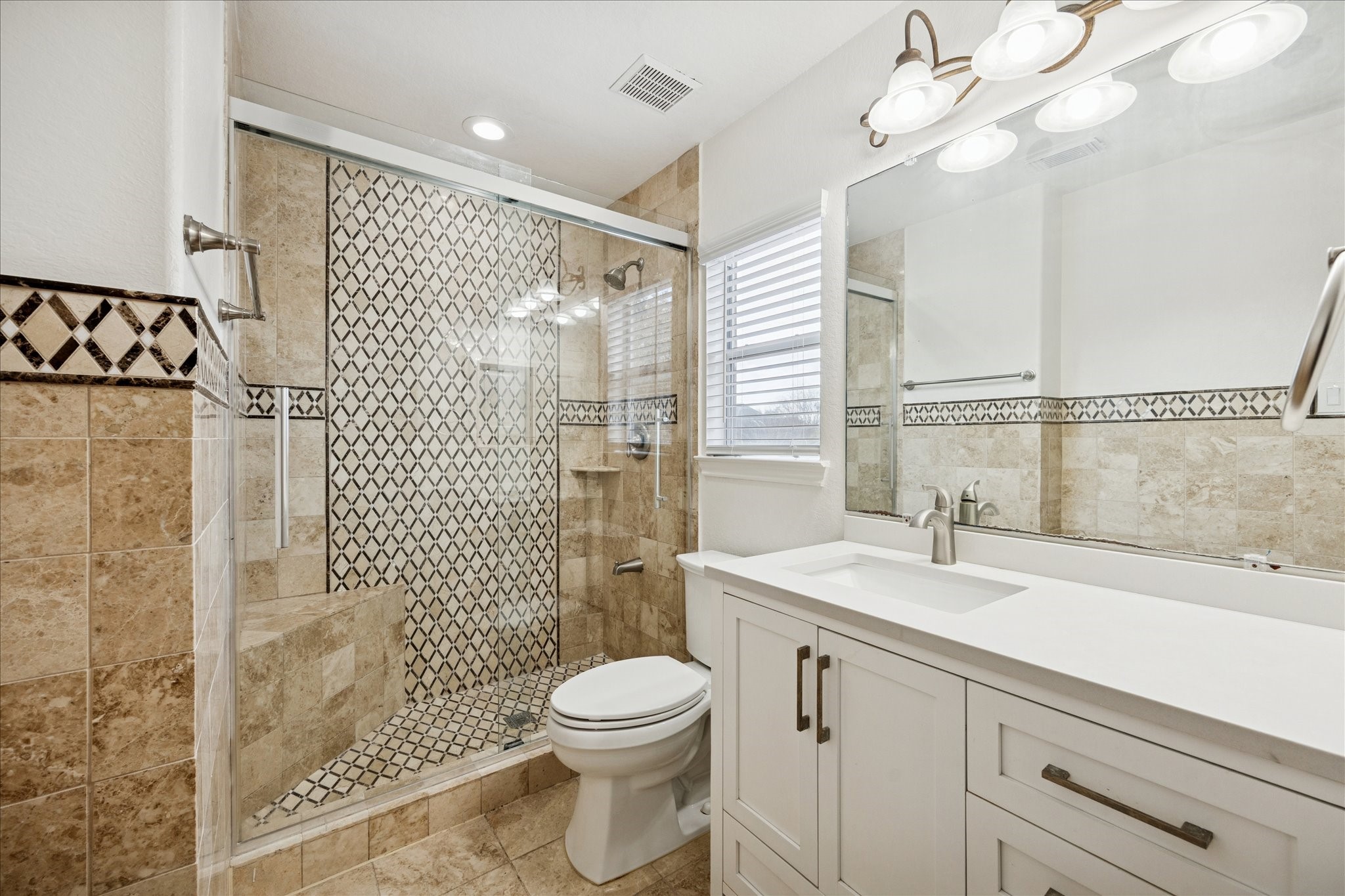 12003 Ensenada Canyon Lane Houston, TX 77041 - Photo 22 of 28 Upstairs bathroom featuring updated fixtures and a clean, refreshed look.