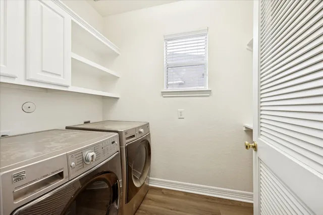 a utility room with dryer and washer