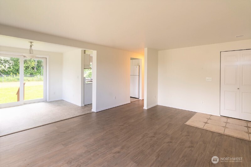 551 South Sullivan Street Seattle, WA 98108 - Photo 17 of 24 an empty room with windows and closet