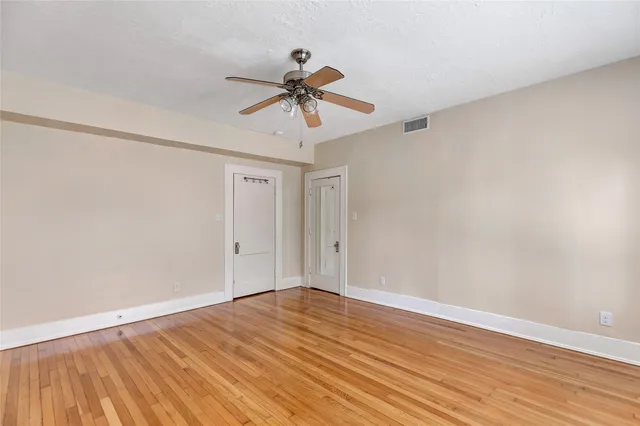 a bathroom with a sink and bathtub with toilet