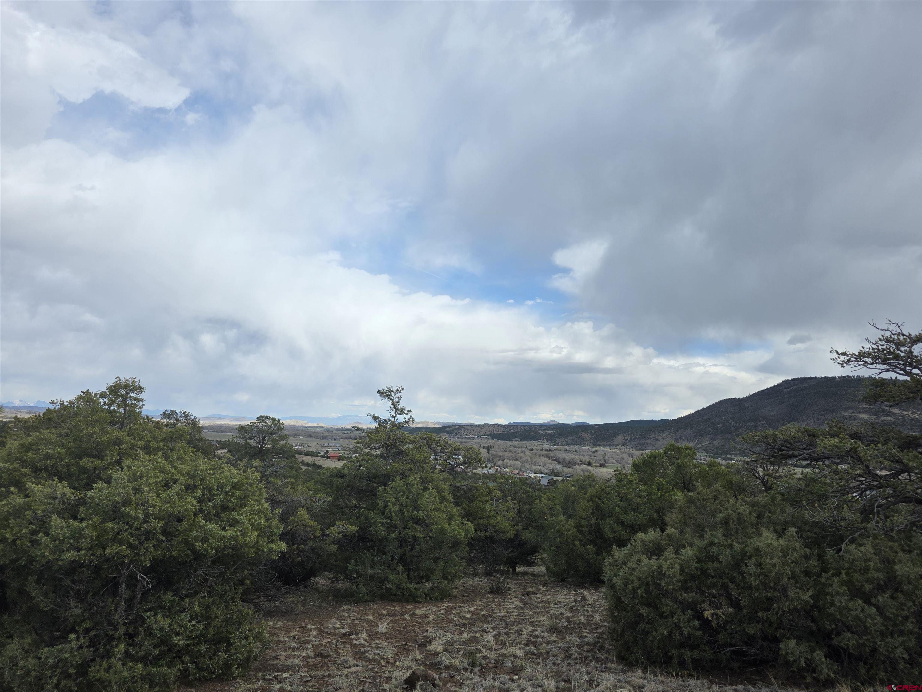 326 Pikes Peak Road South Fork, CO 81154 - Photo 8 of 11 a view of a city and mountains in the background