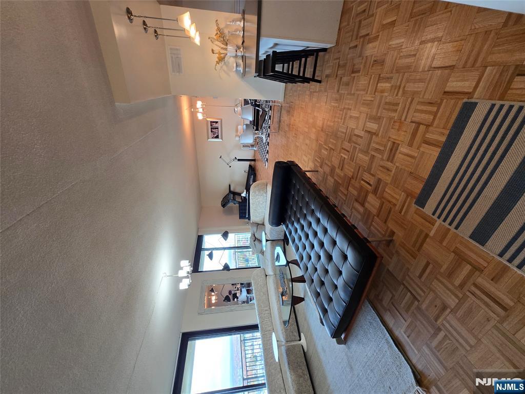 1275 15th Street, Unit PHB Fort Lee, NJ 07024 - Photo 2 of 14 a living room with furniture