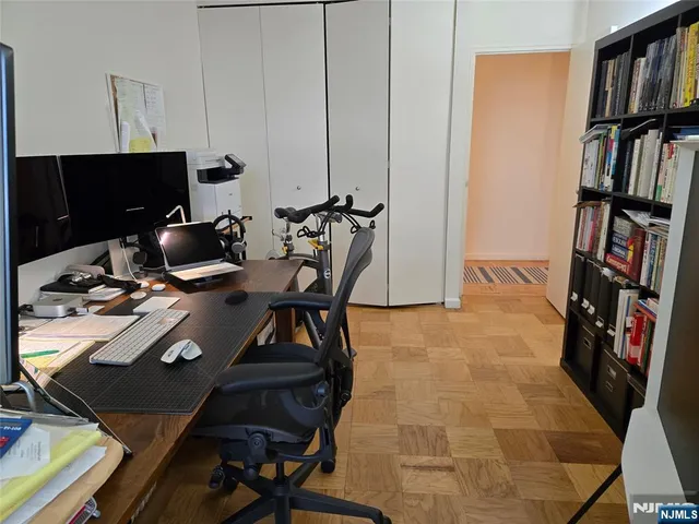 a view of a workspace with furniture