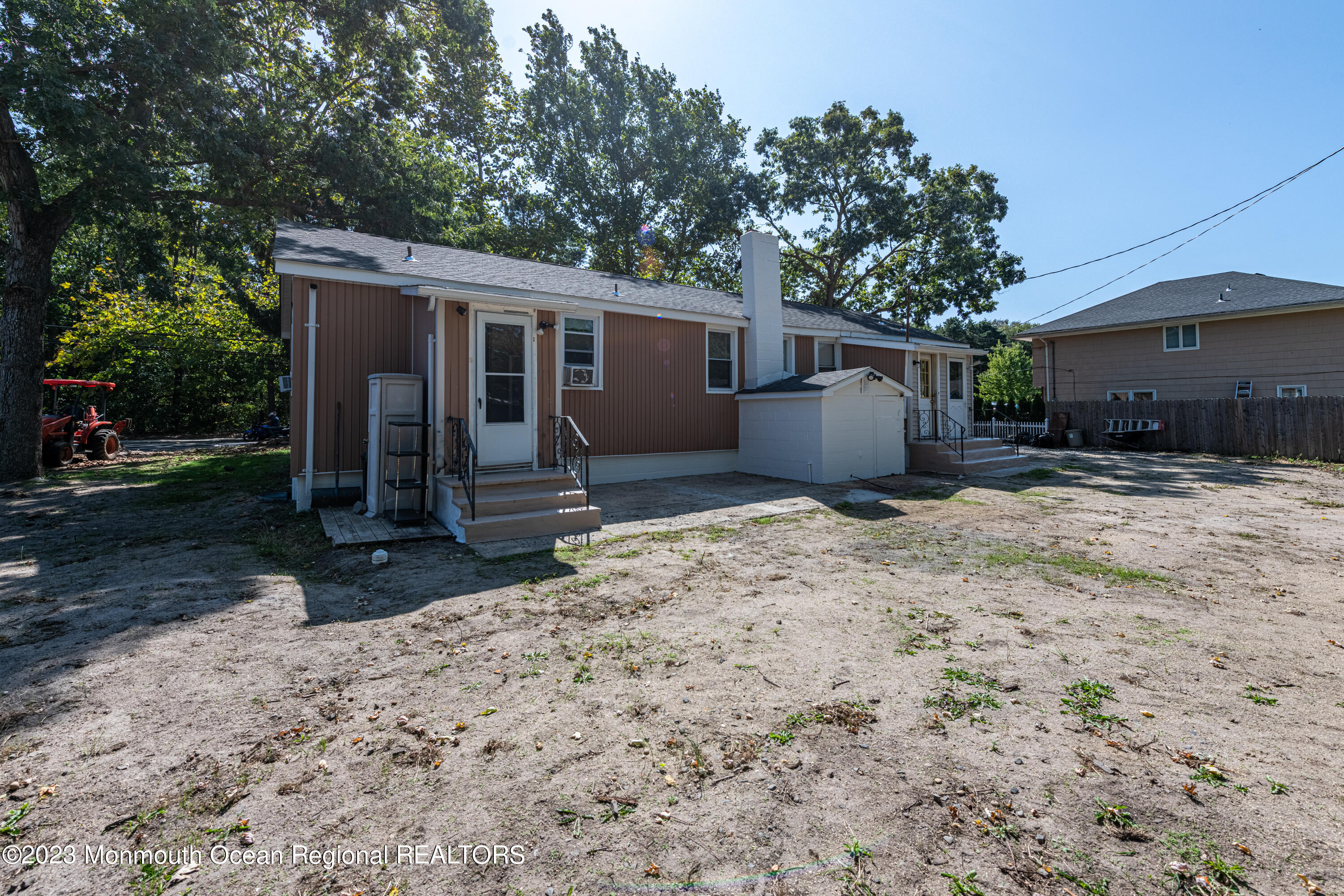 508 Georgia Tavern Road Howell, NJ 07731 - Photo 12 of 33 a view of a house with a yard and a large tree