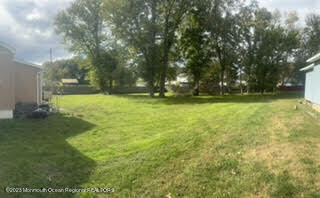 508 Georgia Tavern Road Howell, NJ 07731 - Photo 32 of 33 a view of a field with trees in the background