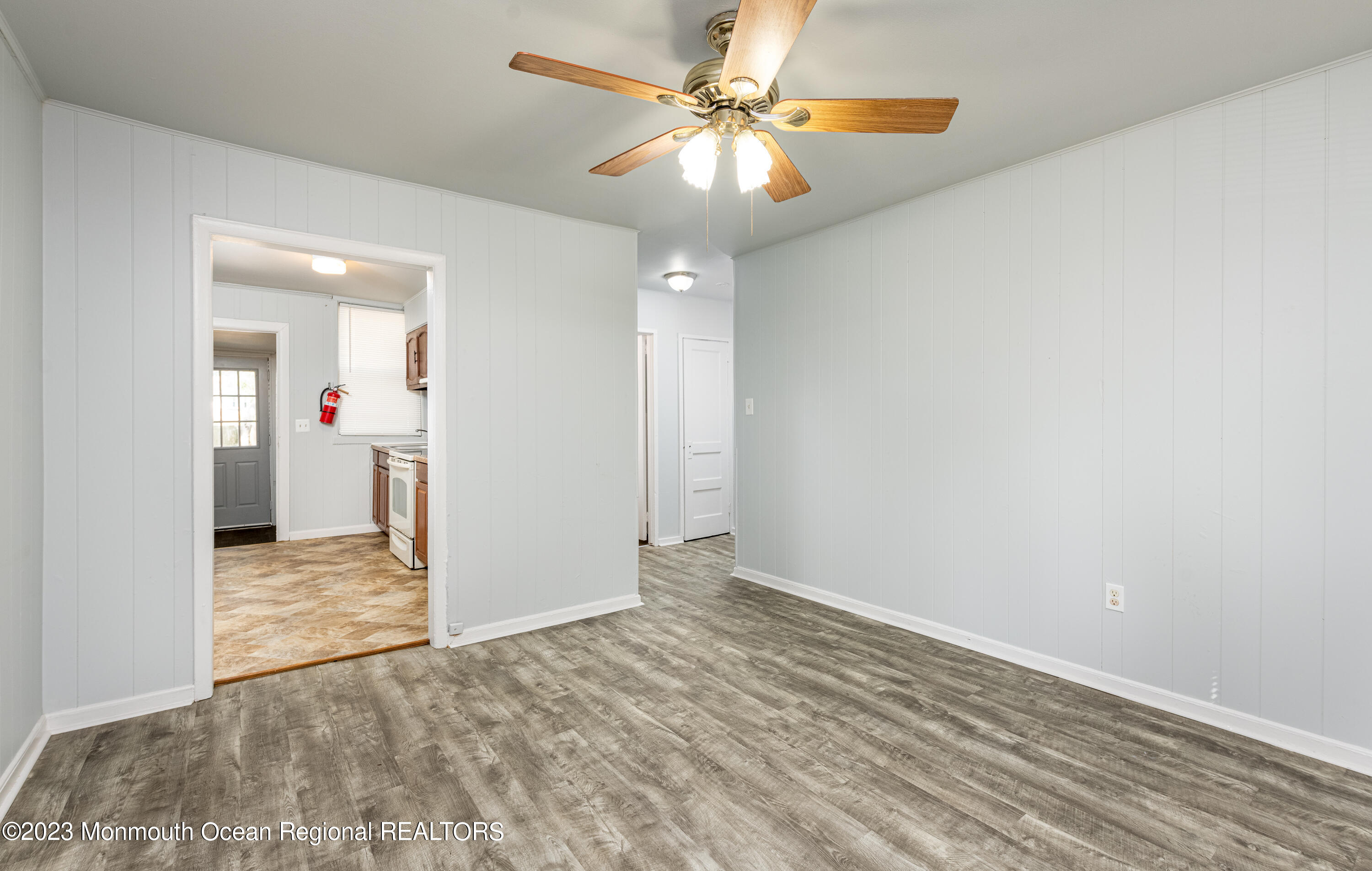 508 Georgia Tavern Road Howell, NJ 07731 - Photo 4 of 33 an empty room with a bathroom and chandelier fan