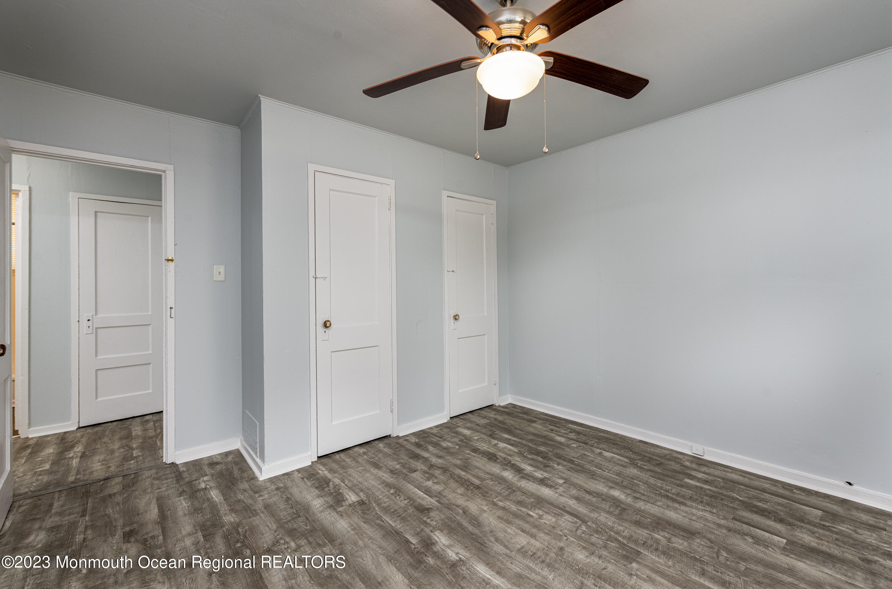 508 Georgia Tavern Road Howell, NJ 07731 - Photo 6 of 33 wooden floor in an empty room
