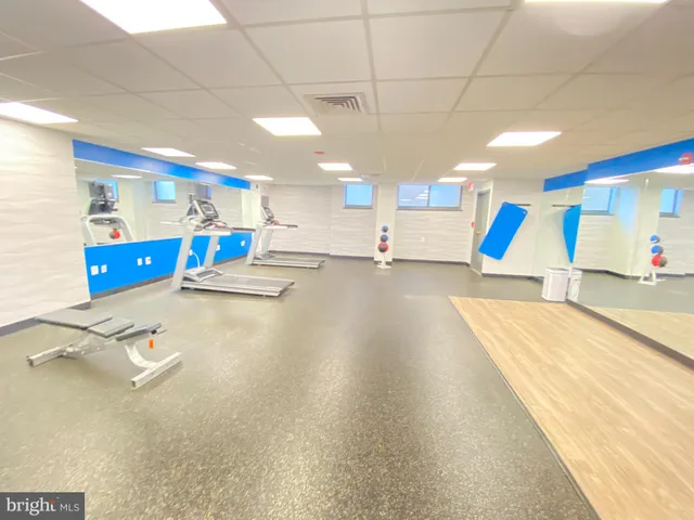 a view of a room with gym equipment