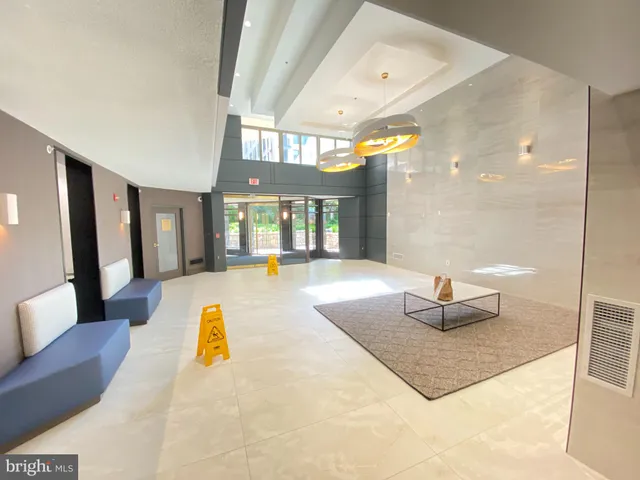 a kitchen with stainless steel appliances granite countertop a stove microwave and cabinets