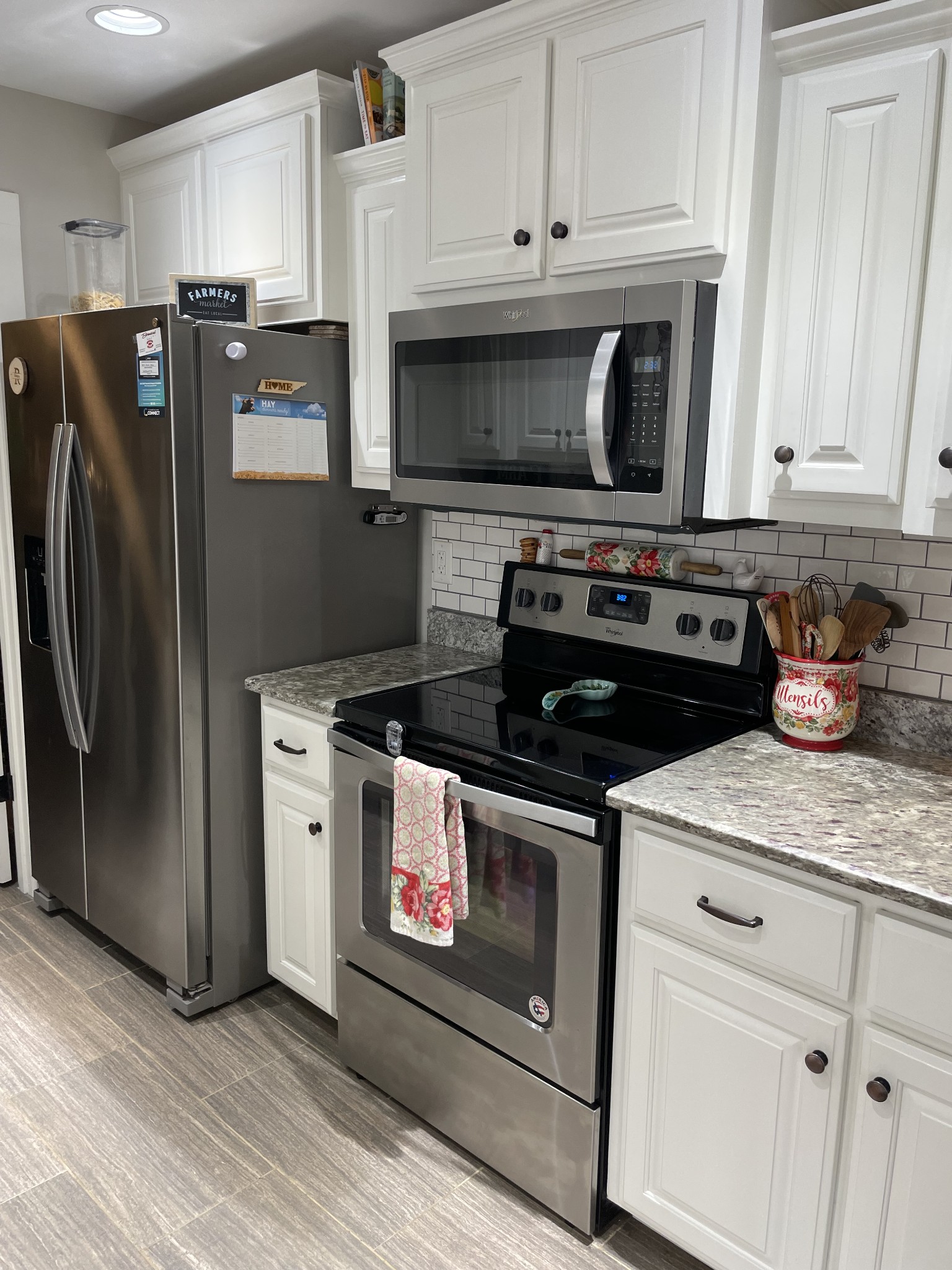 3716 Baggett Road Springfield, TN 37172 - Photo 11 of 40 a kitchen with stainless steel appliances granite countertop a stove a refrigerator and a microwave