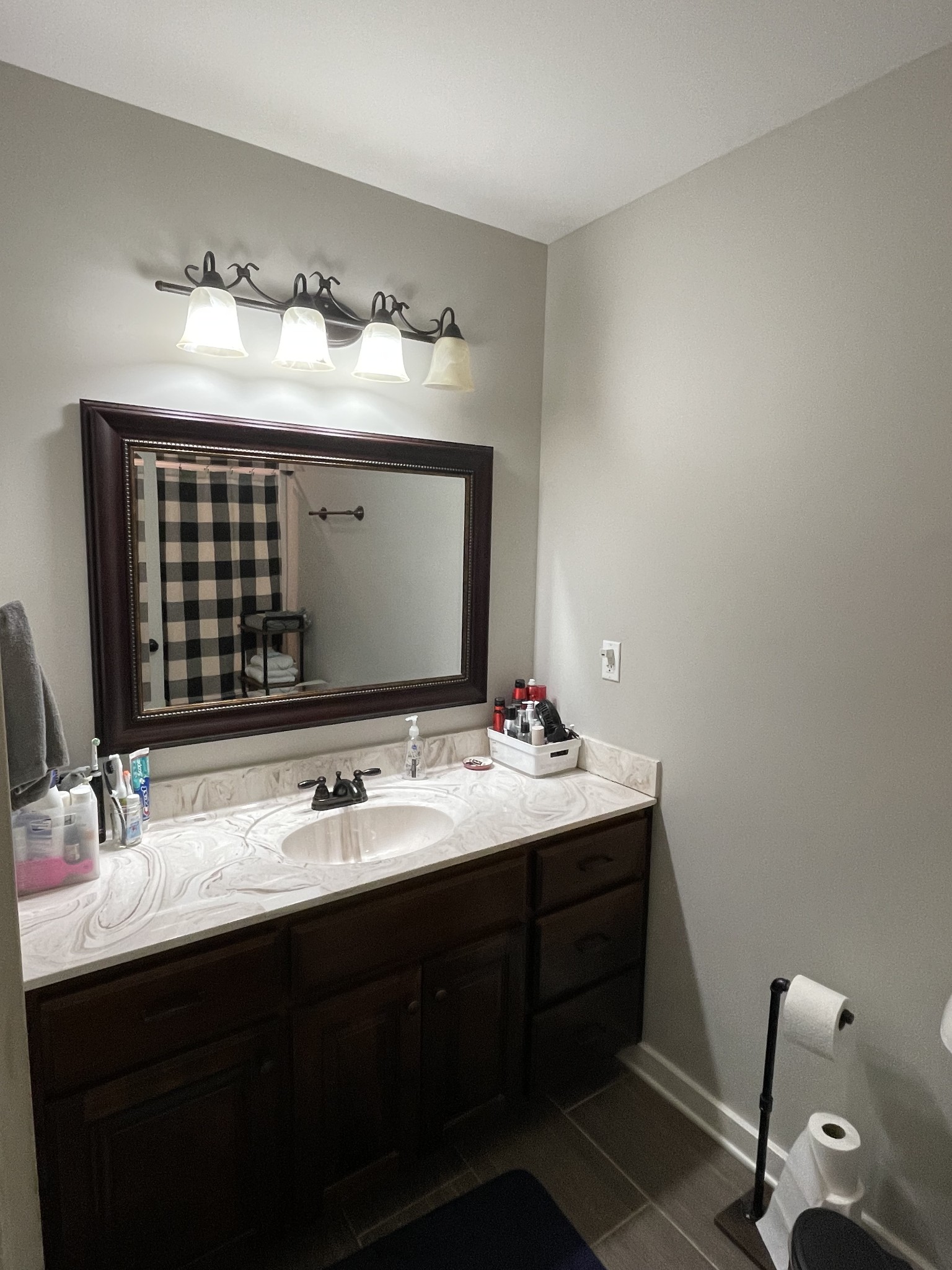 3716 Baggett Road Springfield, TN 37172 - Photo 26 of 40 a bathroom with a sink and a mirror