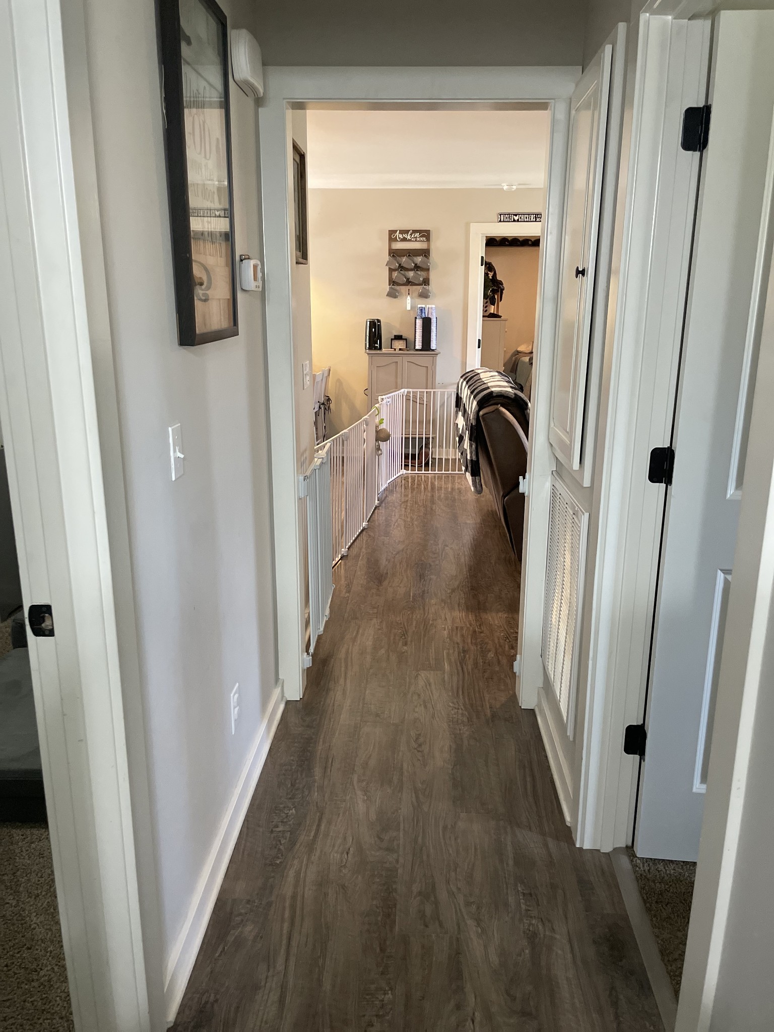 3716 Baggett Road Springfield, TN 37172 - Photo 28 of 40 a view of a hallway and a livingroom with wooden floor