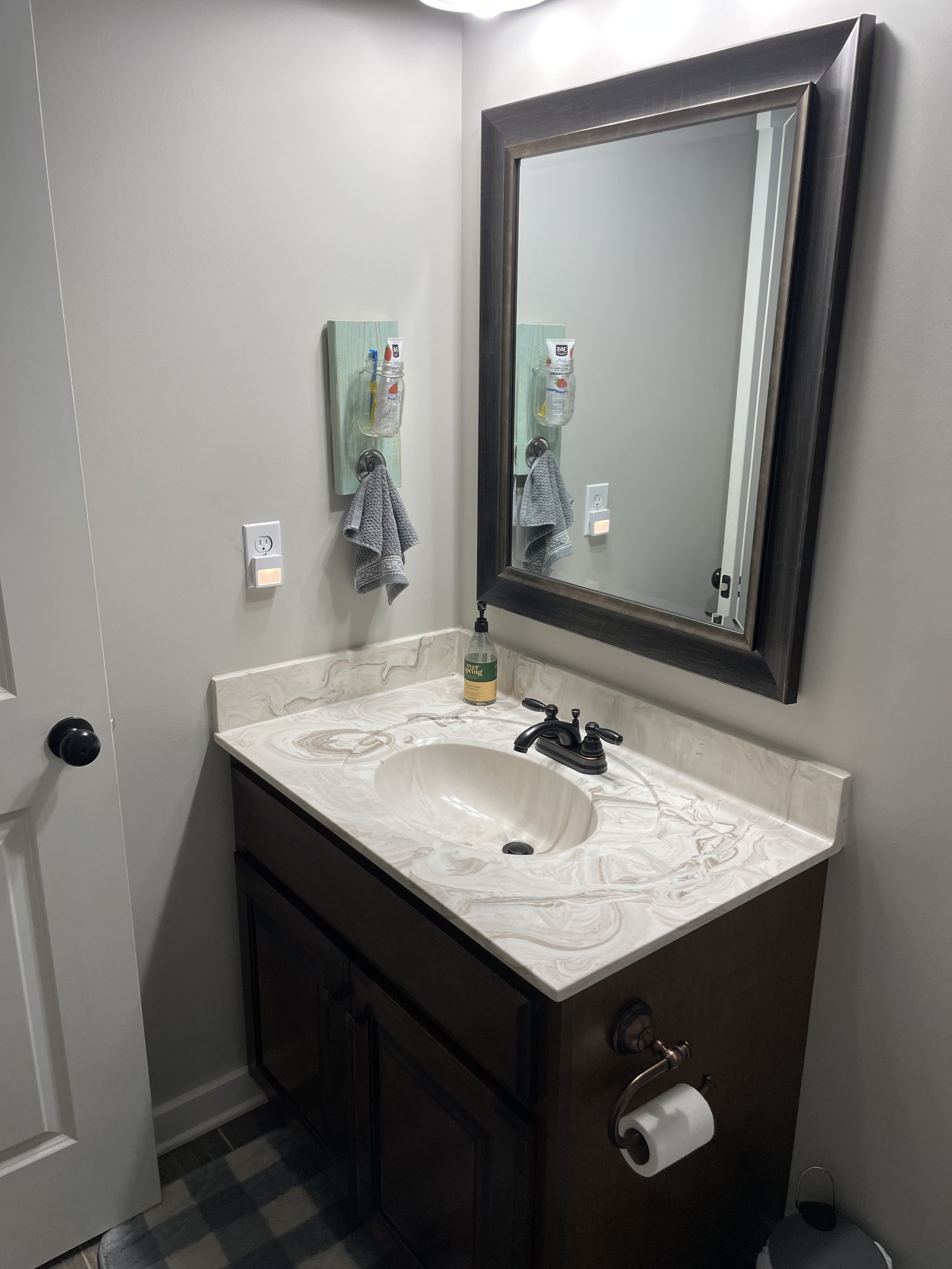 3716 Baggett Road Springfield, TN 37172 - Photo 31 of 40 a bathroom with a sink and a mirror